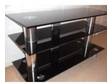 Black Glass TV Stand. This is a good quality three shelf....