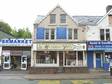 A substantial double fronted commercial unit set in a well